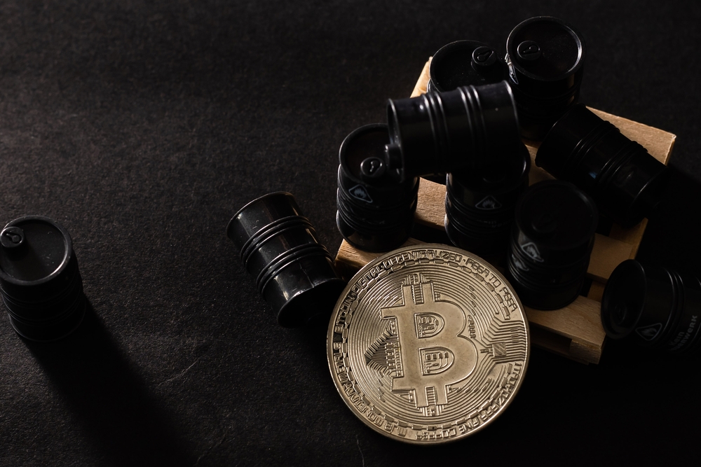 ビットコインに原油ショックの影、利下げ見送りで資金流出リスクも