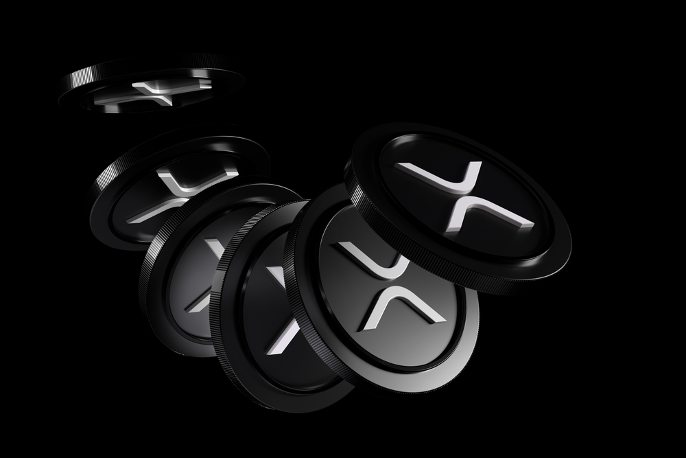 機関投資家がリップル(XRP)を買い増す一方、先物ではショート優勢