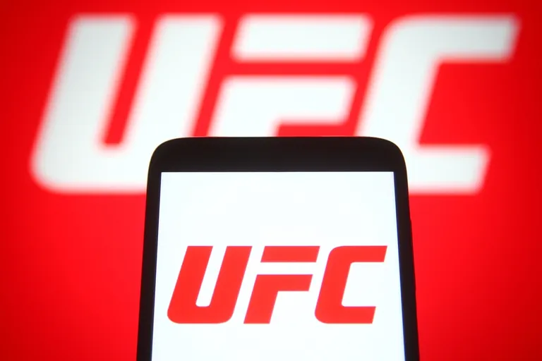 トランプ氏の総合格闘技イベントが仮想通貨の宣伝場に、利益相反の指摘も浮上